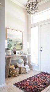 Modern Entryway Makeover | See how it went from a royal mess to huge success with just a few simple updates.