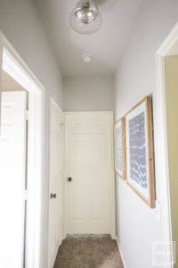 A quick and easy hallway makeover: see how we took this dark hallway from drab to fab!