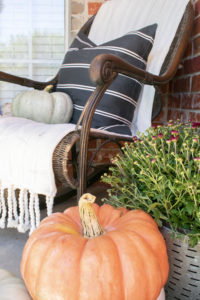 Happy Fall Y'all! Theres no better way to get those pumpkin spice feels than a beautifully decorated fall front porch! See how I decorated our front porch in a way that will carry me through the holidays!