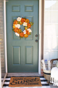 Happy Fall Y'all! Theres no better way to get those pumpkin spice feels than a beautifully decorated fall front porch! See how I decorated our front porch in a way that will carry me through the holidays!