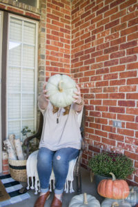 Happy Fall Y'all! Theres no better way to get those pumpkin spice feels than a beautifully decorated fall front porch! See how I decorated our front porch in a way that will carry me through the holidays!