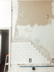 DIY Subway tile backsplash: Learn how to lay your own subway tile backsplash with this amazing tutorial. Subway tile is a classic option for kitchen backsplash and is one of the most affordable options on the market.