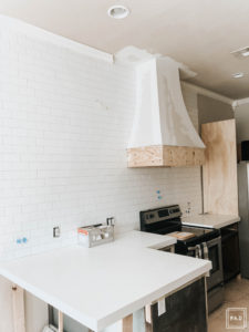 DIY Subway tile backsplash: Learn how to lay your own subway tile backsplash with this amazing tutorial. Subway tile is a classic option for kitchen backsplash and is one of the most affordable options on the market.