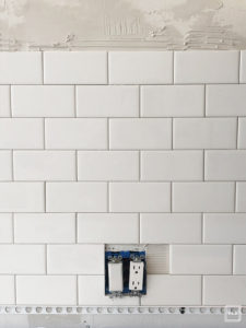 diy subway tile backsplash: Learn how to lay your own subway tile backsplash with this amazing tutorial. Subway tile is a classic option for kitchen backsplash and is one of the most affordable options on the market.