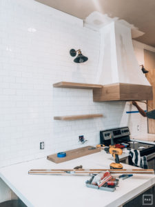 DIY white oak open shelving without breaking the bank. See how we added four white oak shelves to our kitchen for under $250