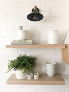 DIY white oak open shelving without breaking the bank. See how we added four white oak shelves to our kitchen for under $250