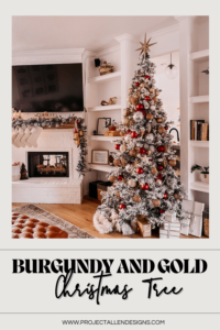 BURGUNDY AND GOLD CHRISTMAS TREE DECORATING IDEAS | Living room decorated for Christmas with a Flocked Christmas tree, burgundy, gold, and silver ornaments, and a fireplace mantle decorated with flocked garland, bottle brush trees, large gold bells, and cream stockings.